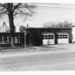 Vernon Fire company building with Christmas tree decoration on roof.